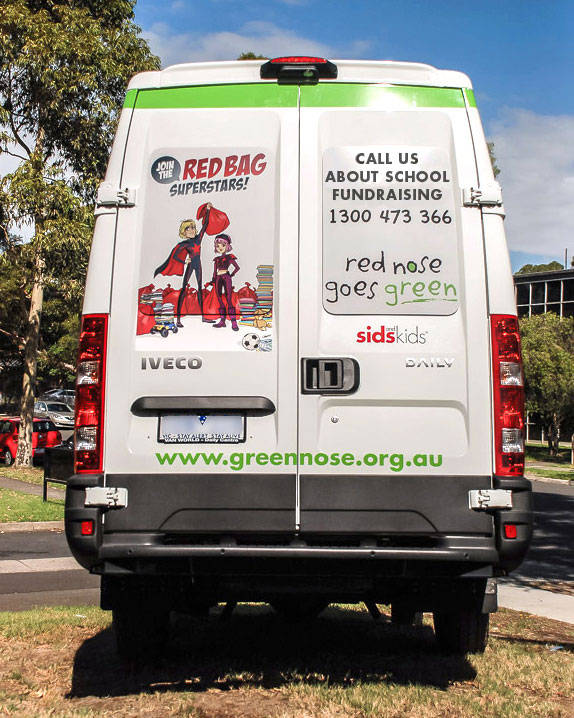 Red Nose Goes Green van graphics back